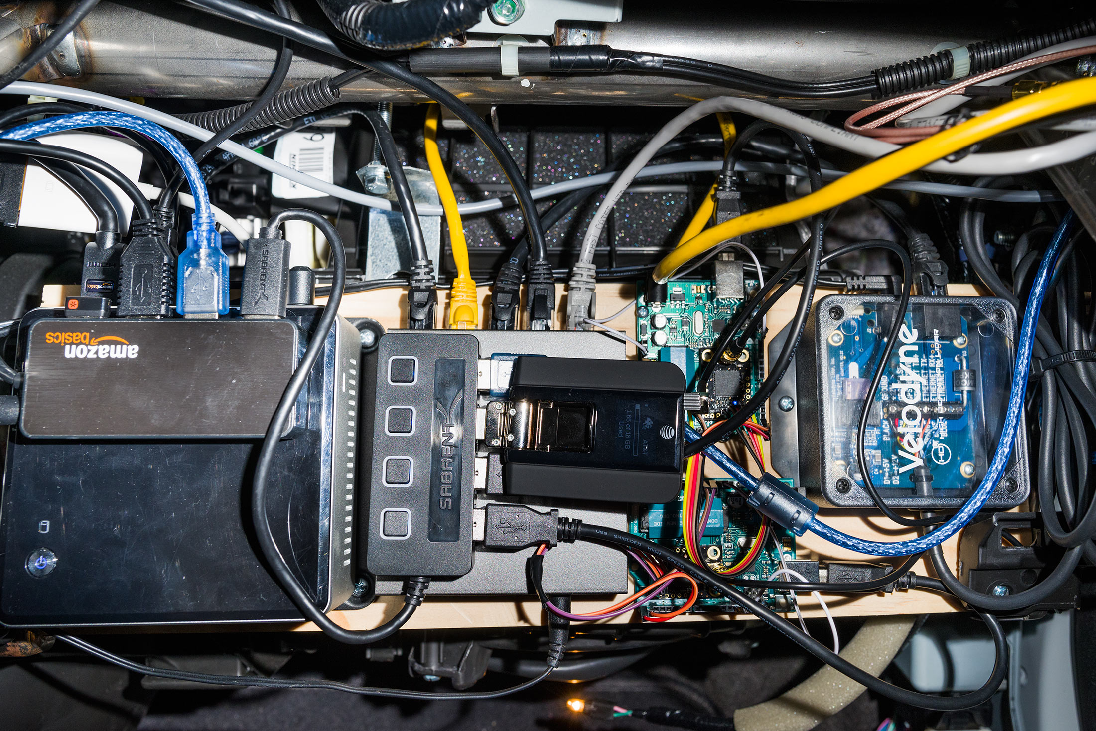 The electronics in George Hotz’s glove compartment