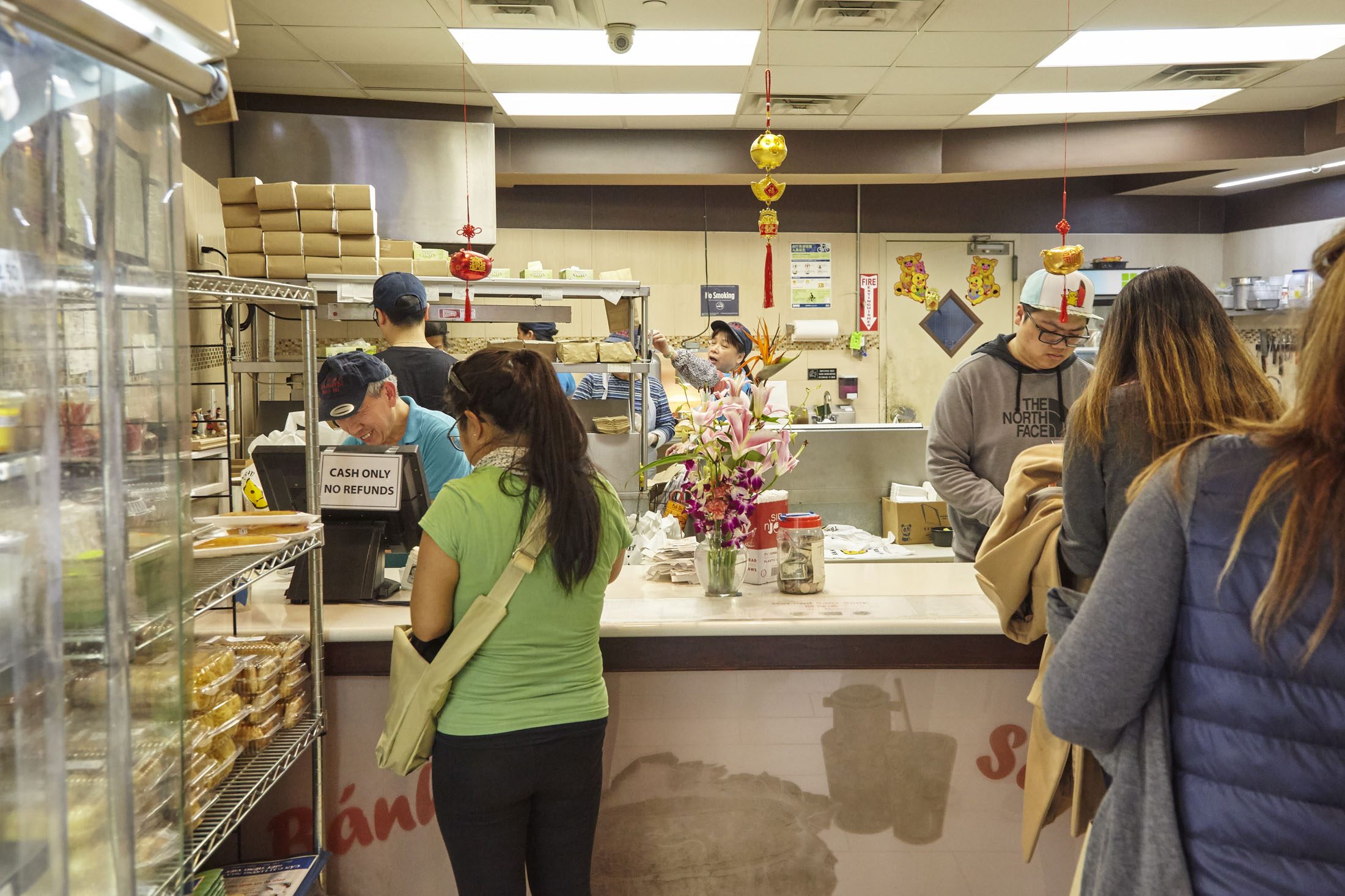 Lines form at Banh Mi Saigon’s newer, slightly more spacious location.