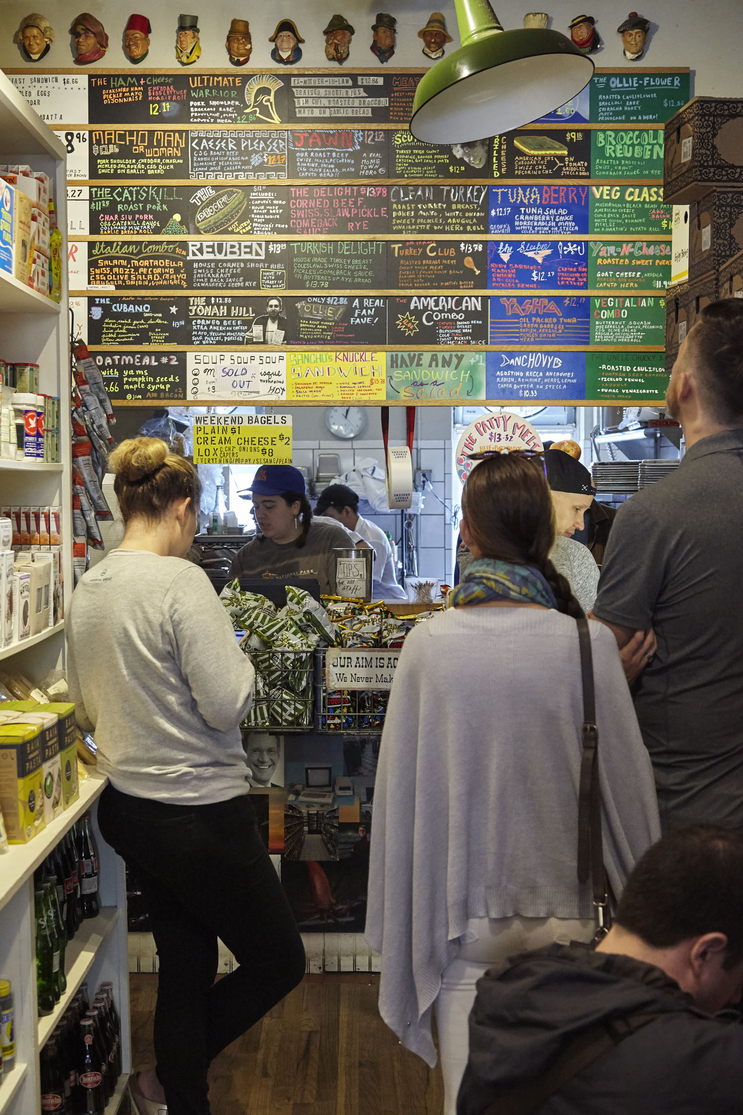 A multitude of offbeat sandwiches, chosen from the colorful menu board