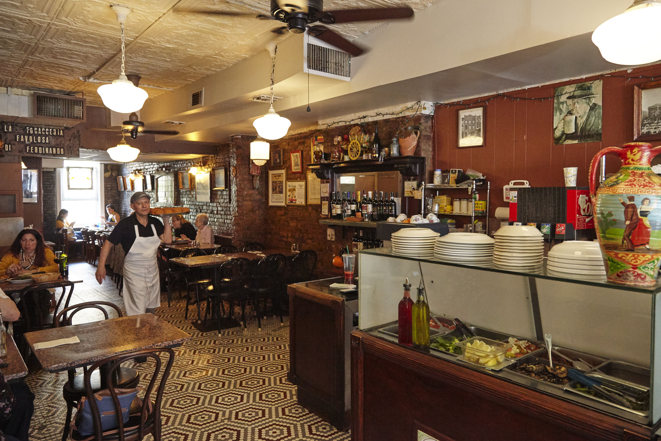 Owner Francesco Buffa (bottom), son-in-law of the eponymous Ferdinando, oversees the Sicilian menu at this old-school Brooklyn restaurant. 