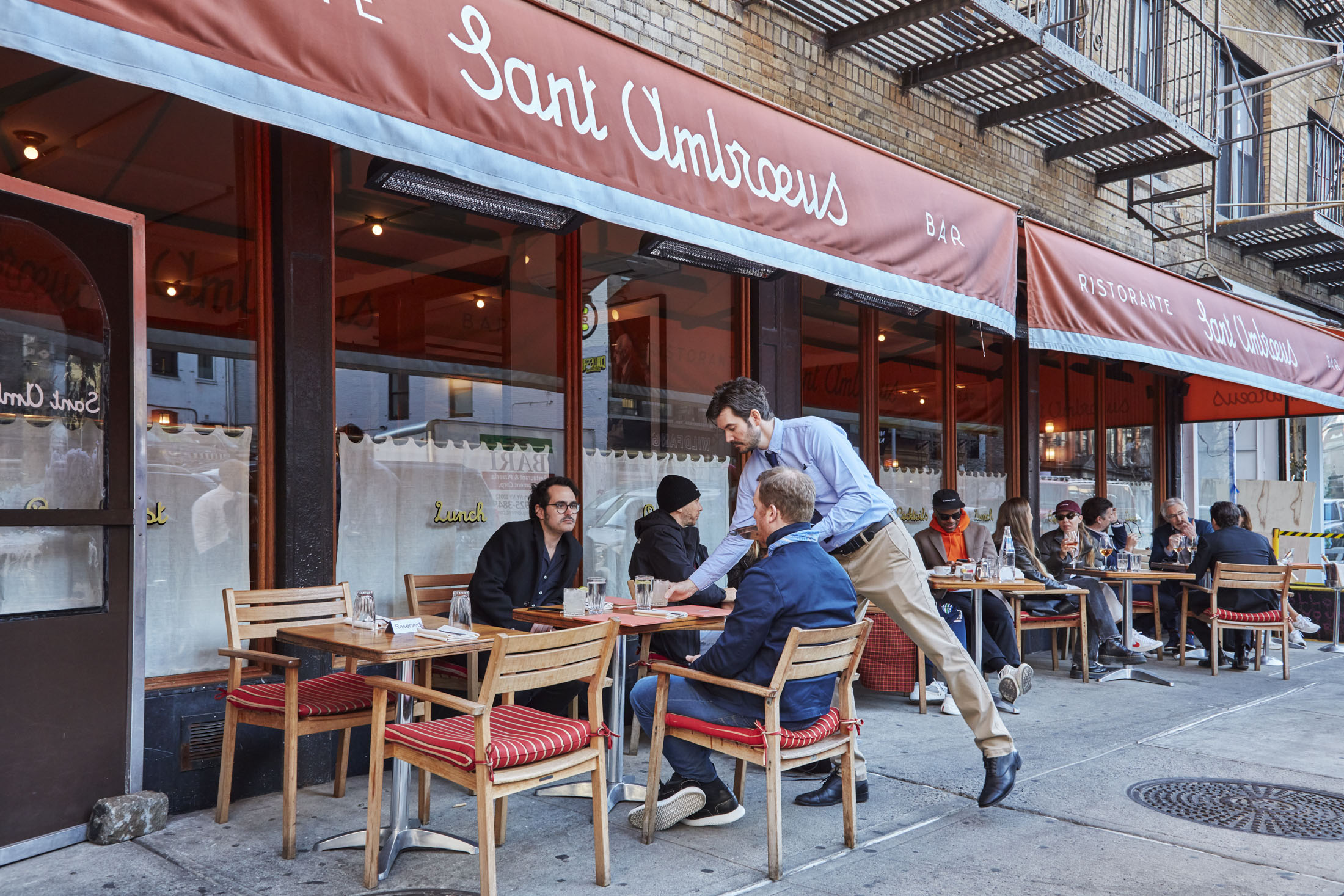 The elegant Milanese outpost, with prime sidewalk seating in SoHo (bottom), serves everything from cocktails to pastries and slider-sized sandwiches.