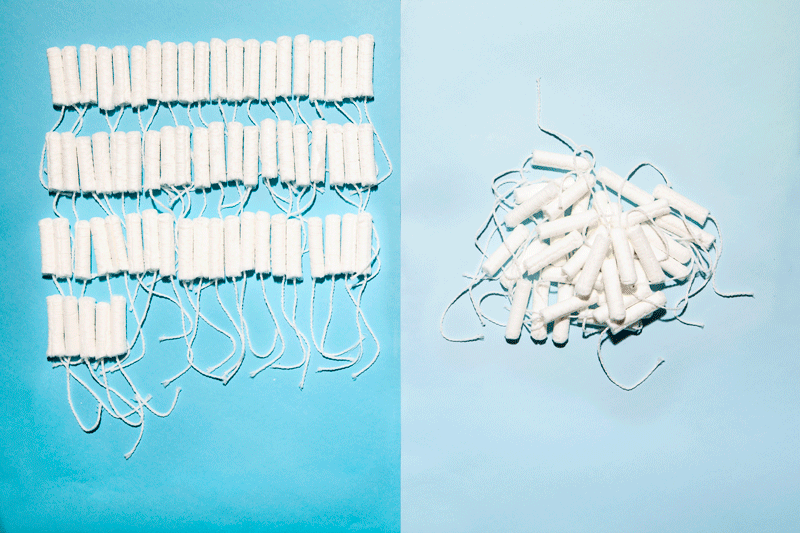 Stop-motion animation of 65 tampons on left on medium blue background, and pile of 35 tampons on light blue background on right