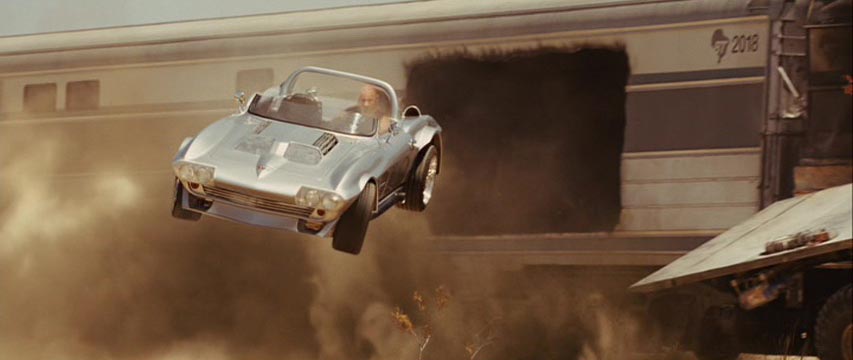 Car driving out of a speeding train