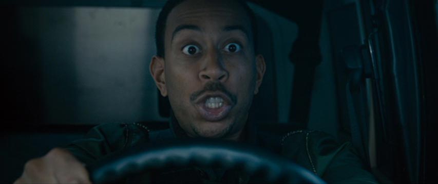 Close-up of man using an expletive